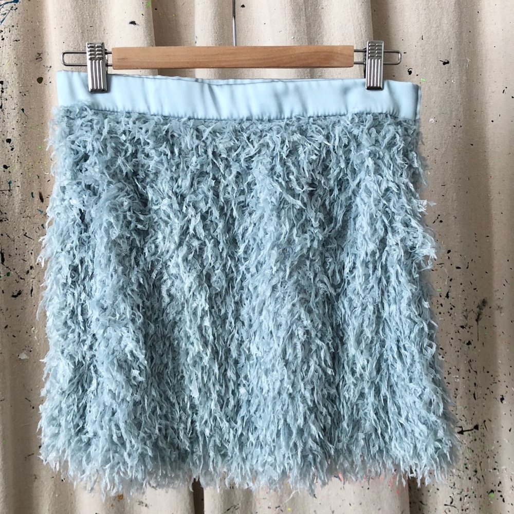 Baby blue feather fringe mini skirt.